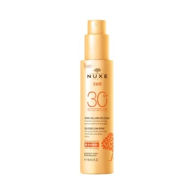 Frasco spray solar Nuxe Sun SPF 30 laranja com tampa e texto frontal e desenho de flor.