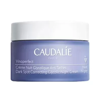 Frasco roxo com creme de noite Caudalie Vinoperfect