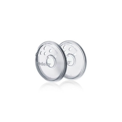 Duas tampas plásticas transparentes com buracos e texto medela