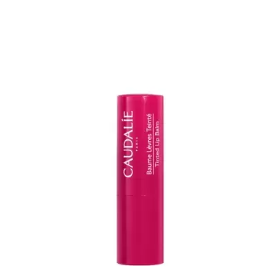 Bálsamo labial tintado CAUDALIE rosa com texto branco