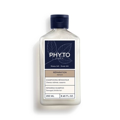 Frasco de shampoo PHYTO Paris com rótulo azul e texto em francês e inglês