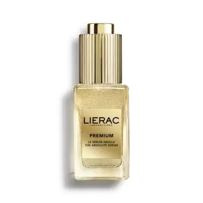 Frasco de sérum dourado da LIERAC sobre fundo branco