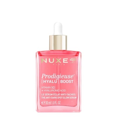 Frasco rosa transparente de sérum anti-manchas NUXE com conta-gotas.