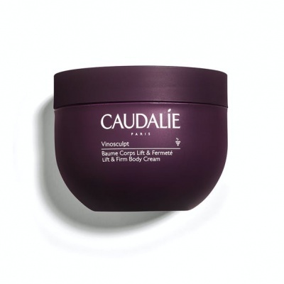 Frasco roxo de creme corporal Caudalie com tampa, texto branco