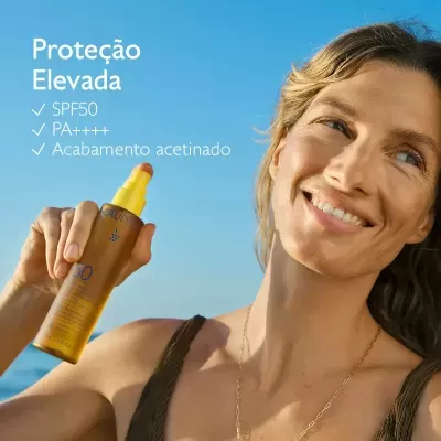 Frasco de proteção solar Caudalie SPF50 com tampa amarela e texto ao lado