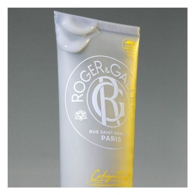Frasco cinzento claro de creme da marca ROGER & GALLET com texto branco e amarelo