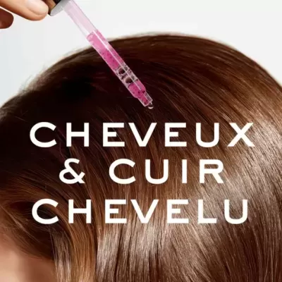 Conta-gotas aplicando líquido rosa em cabelo castanho brilhante com texto CHEVEUX & CUIR CHEVELU