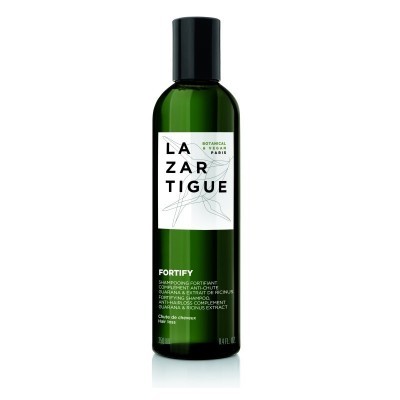 Frasco verde de champô LAZARTIGUE com etiqueta branca e tampa preta