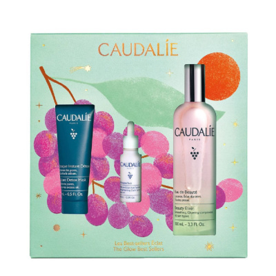 Caixa de produtos Caudalie com máscara detox azul, sérum e Beauty Elixir rosa