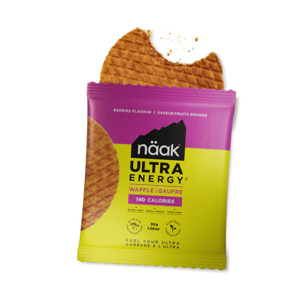 Snack waflle näak ULTRA ENERGY sabor frutos vermelhos com embalagem amarela e rosa e 140 calorias