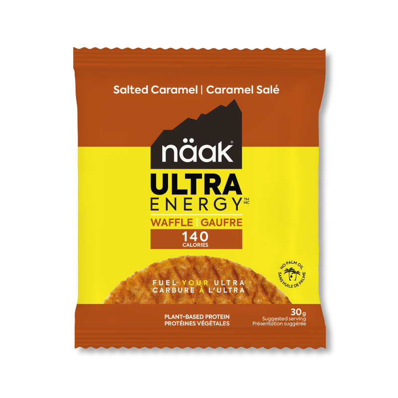 Embalagem amarela e castanha de snack waffle näak Ultra Energy sabor caramel salé