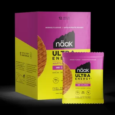 Embalagem e pacote rosa e amarelo de waffles Näak Ultra Energy sabor frutos vermelhos
