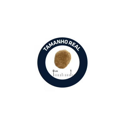 Bolacha redonda castanha clara com textura granulada sobre régua, com texto 'TAMANHO REAL'