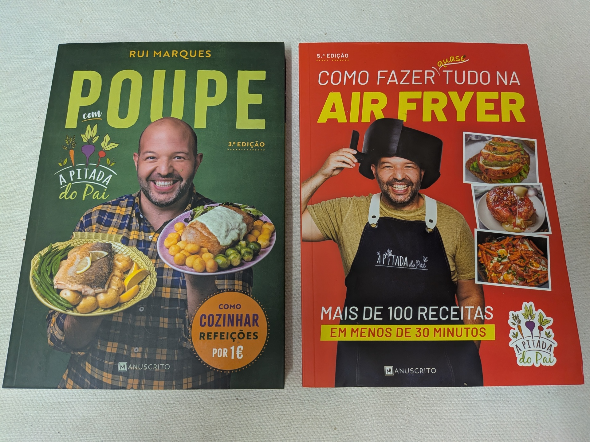 Rui Marques - Poupe com a Pitada do Pai + Como Fazer Quase Tudo na Air Fryer Dois livros de culinária com capas coloridas e fotos de receitas e homem sorridente.
