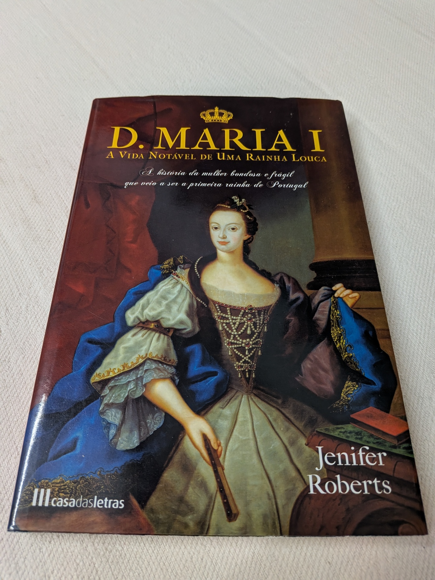 Jenifer Roberts - D. Maria I (A Vida Notável de uma Rainha Louca) Capa do livro D. Maria I com imagem da rainha em traje histórico