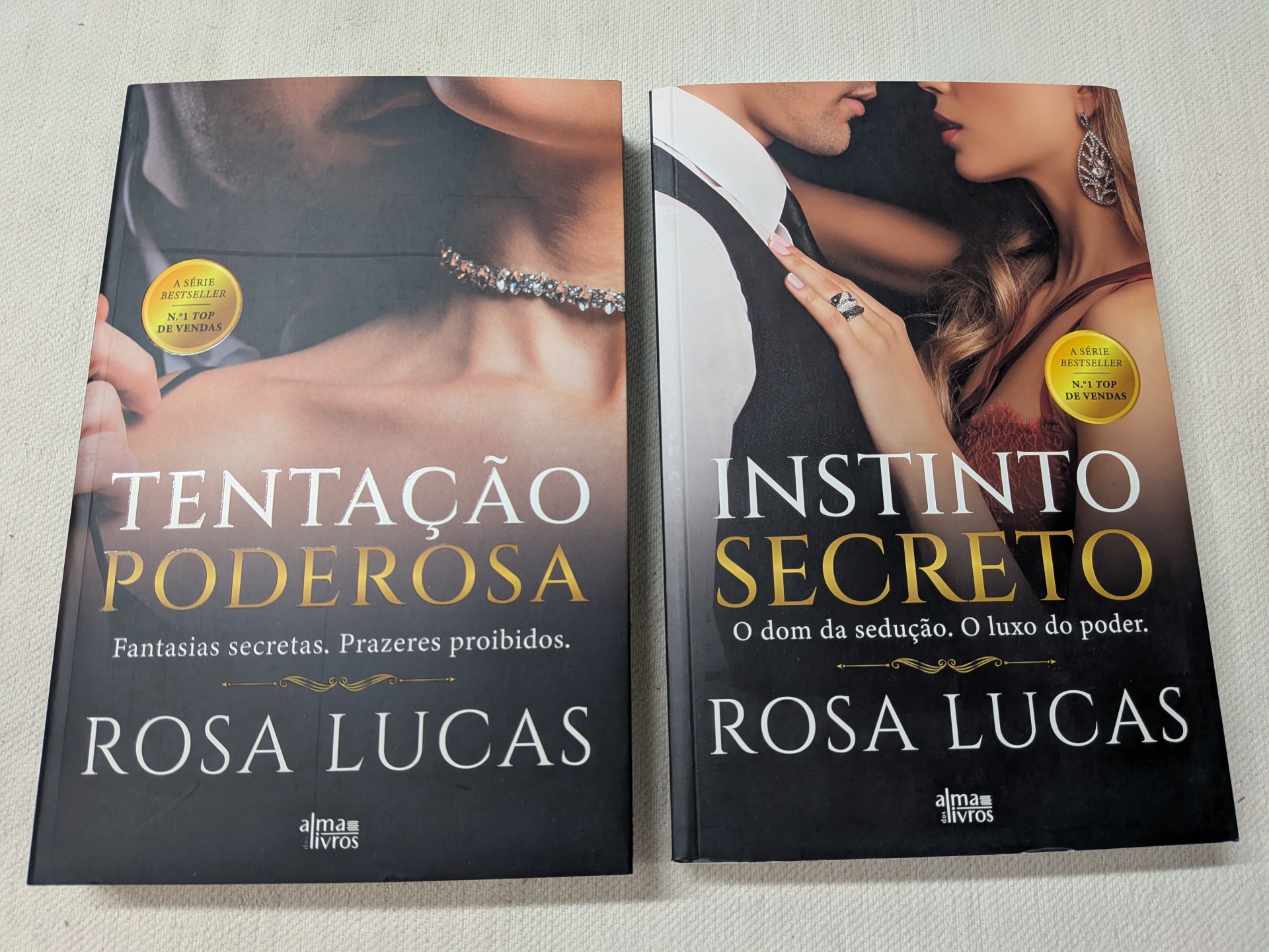 Rosa Lucas - Tentação Poderosa + Instinto Secreto Duas capas de livros com títulos Tentação Poderosa e Instinto Secreto de Rosa Lucas