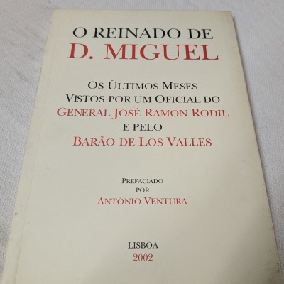 Capa de livro O REINADO DE D. MIGUEL em fundo branco com texto em preto e vermelho