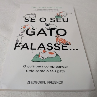Capa de livro com título 'Se o seu gato falasse...' e ilustrações de gatos coloridos