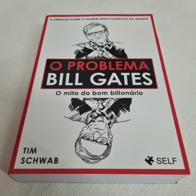 Capa do livro 'O Problema Bill Gates' com desenhos e texto em vermelho e preto.