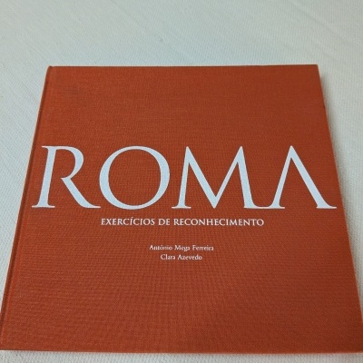 Livro de capa laranja com texto branco ROMA Exercícios de Reconhecimento