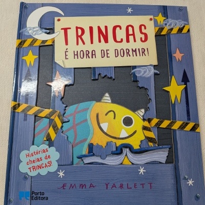 Capa de livro infantil com monstro amarelo e título Trincas É Hora de Dormir
