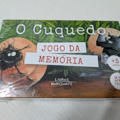 Caixa de jogo da memória com ilustrações coloridas e texto em português.