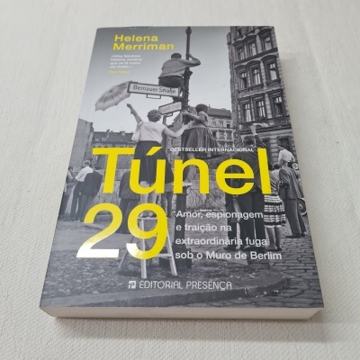 Livro Túnel 29 com capa preta e branca e texto amarelo e branco