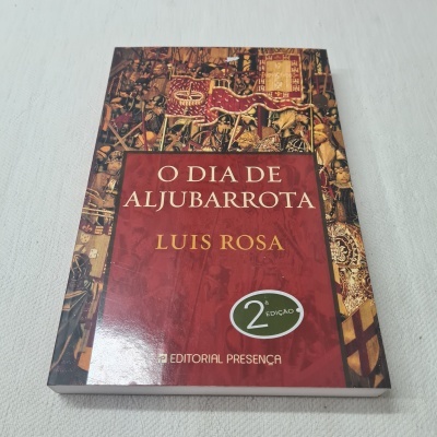 Livro 'O DIA DE ALJUBARROTA' de Luis Rosa com capa ilustrada em fundo branco