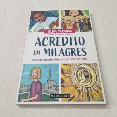 Livro 'Acredito em Milagres' de Filipa Sáragga com capa ilustrada colorida