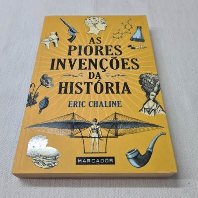 Capa amarela do livro 'As Piores Invenções da História' com desenhos e texto em preto
