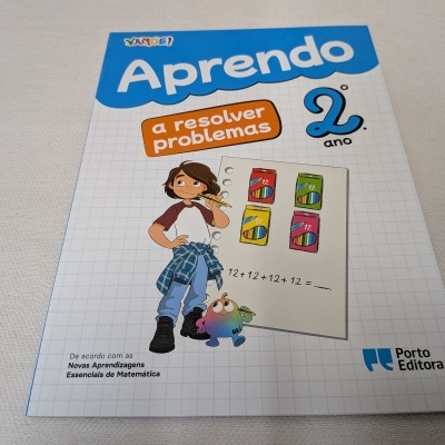 Livro educativo Aprendo a resolver problemas 2.º ano com ilustração e logo Porto Editora