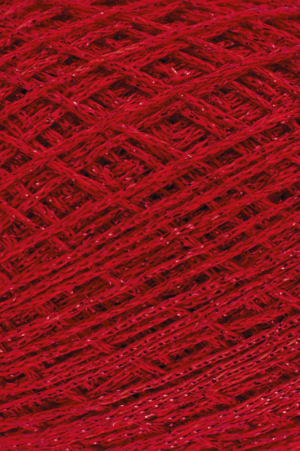 Novelo de fio vermelho trançado com brilho