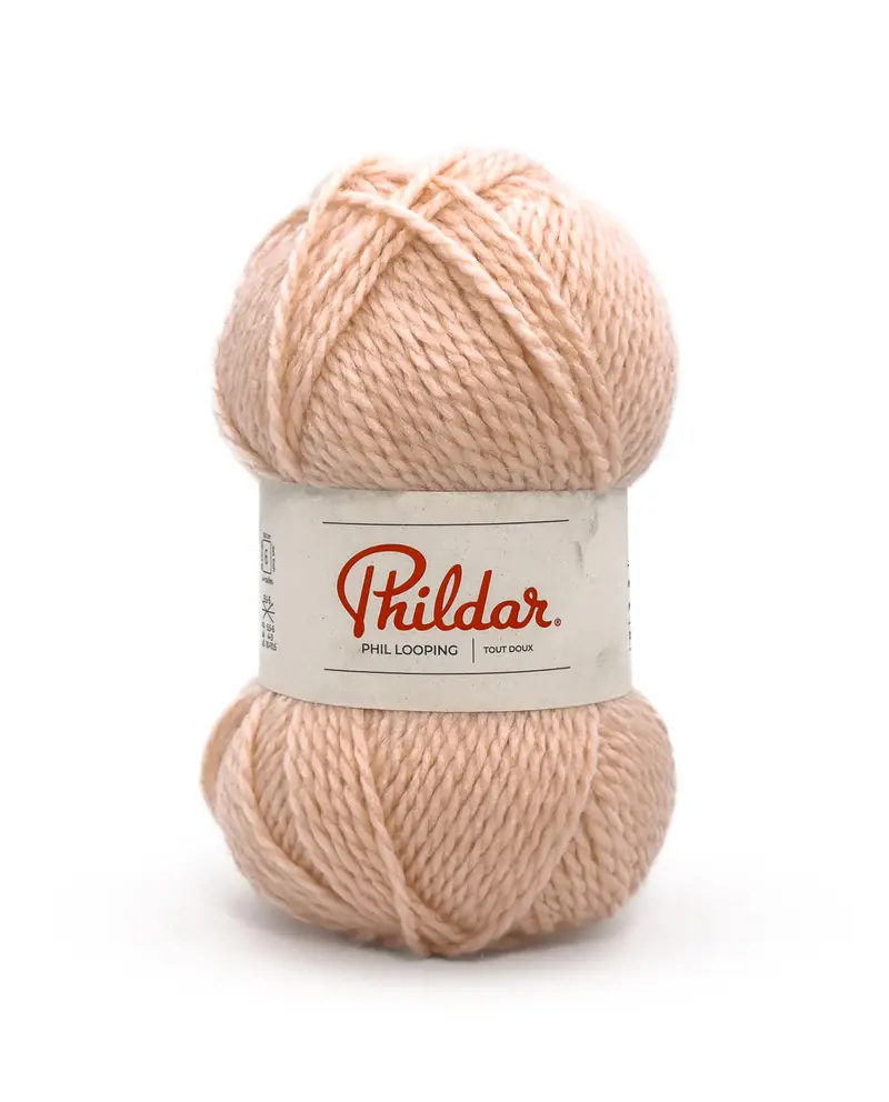 Novelo de lã bege claro da marca Phildar com etiqueta branca