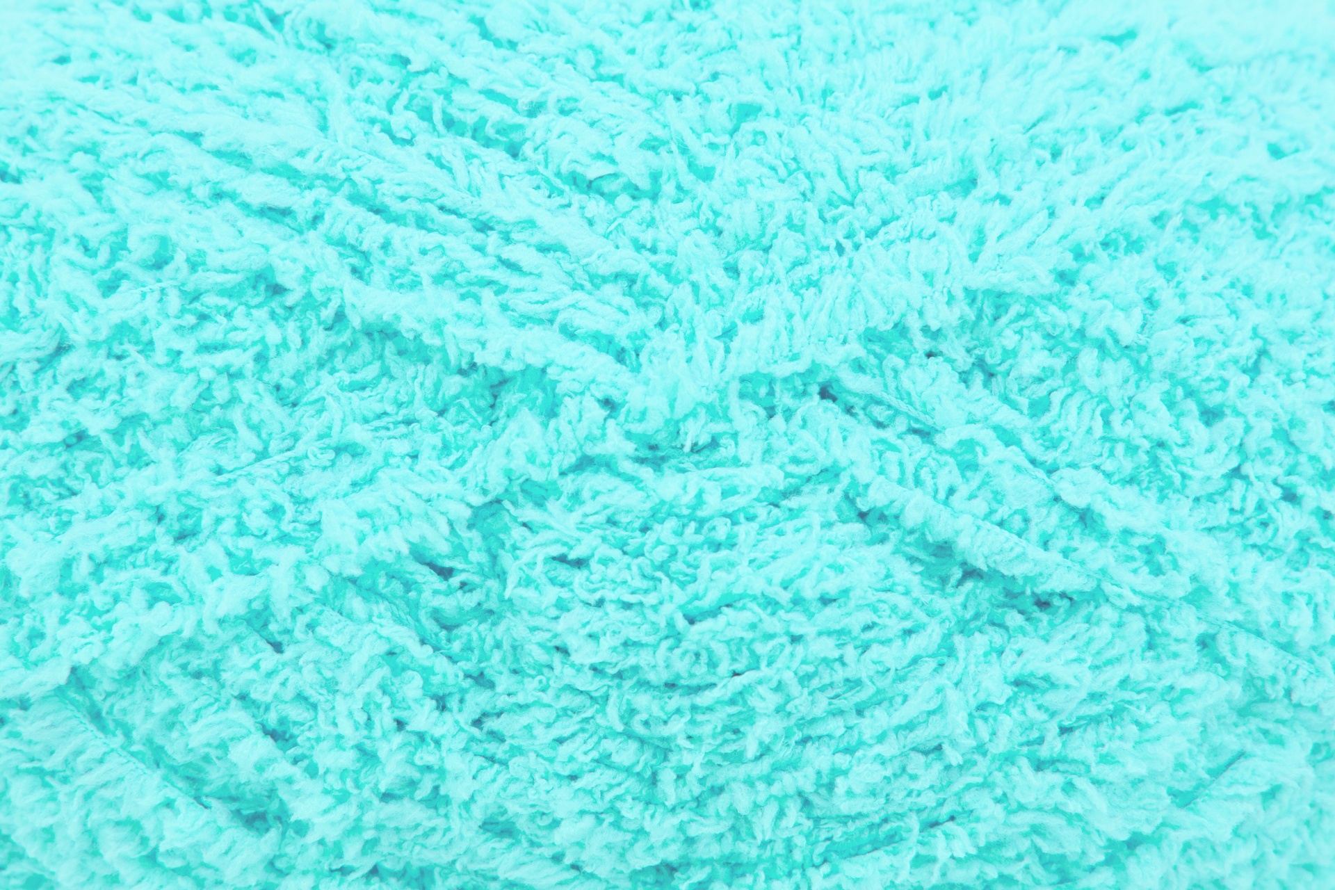 Pano azul turquesa felpudo com textura ondulada