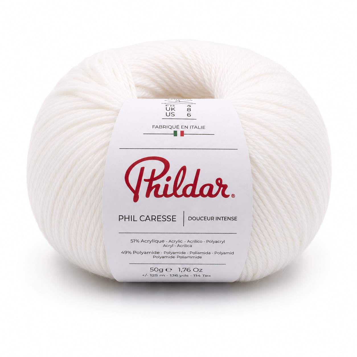 Novelo de fio branco Phildar com etiqueta de composição e origem