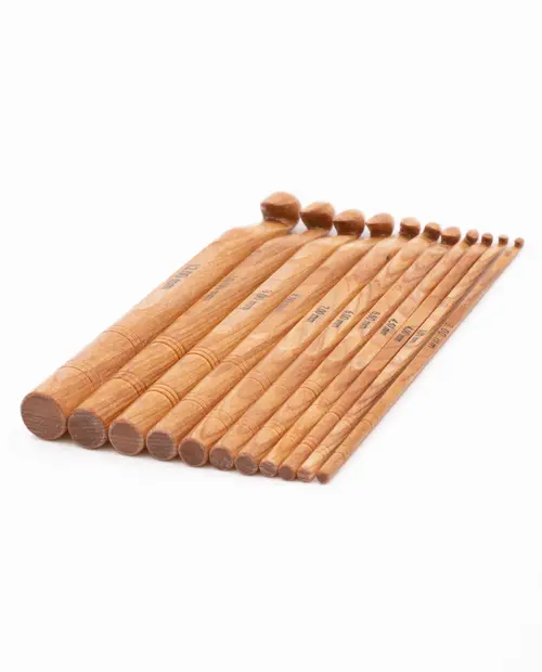 Conjunto de colheres medidoras em madeira clara de vários tamanhos