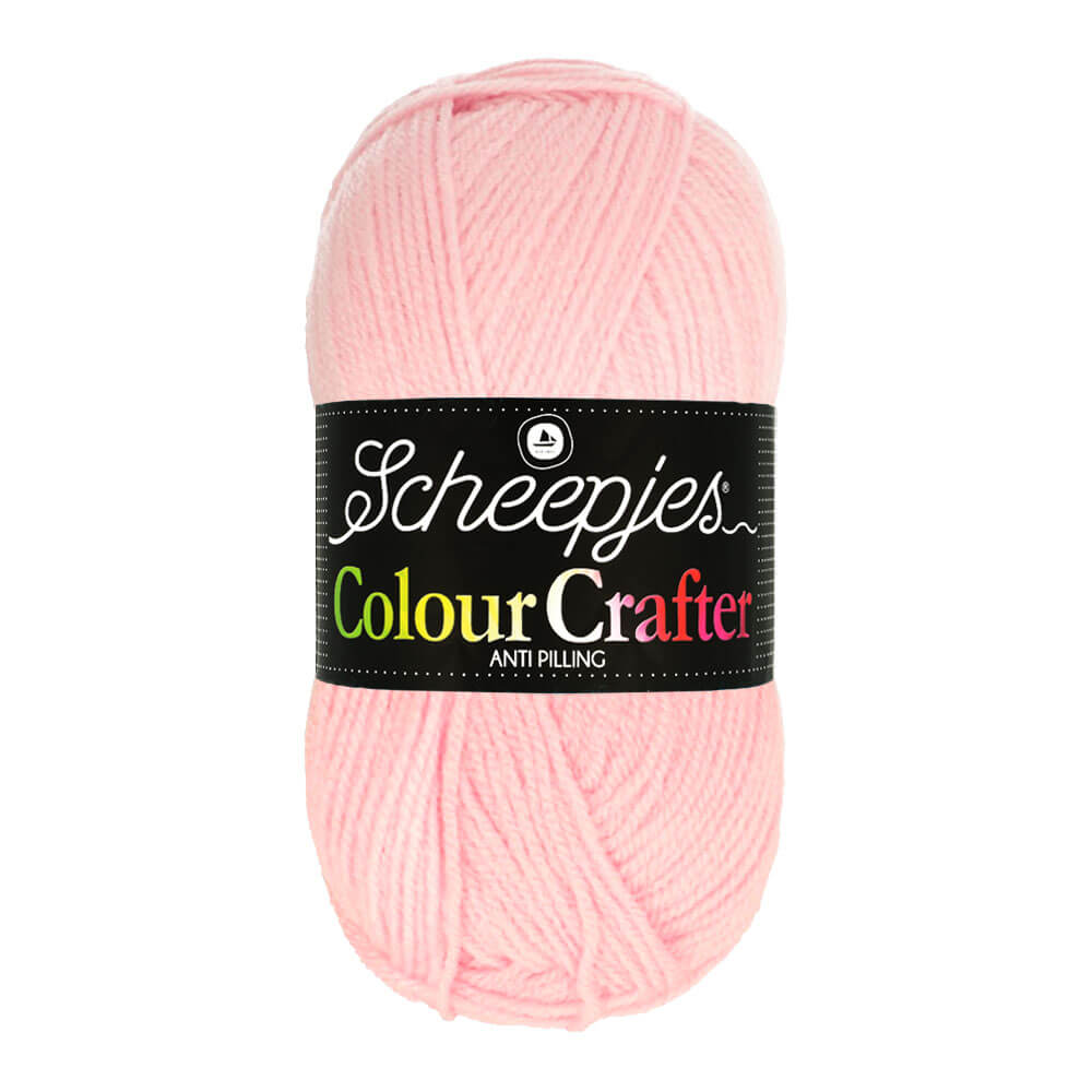 Novelo de lã cor-de-rosa com etiqueta preta da marca Scheepjes Colour Crafter