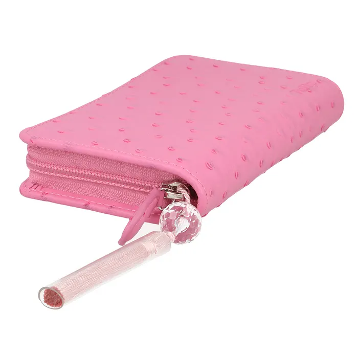 Carteira rosa com padrão de bolinhas e fecho de correr