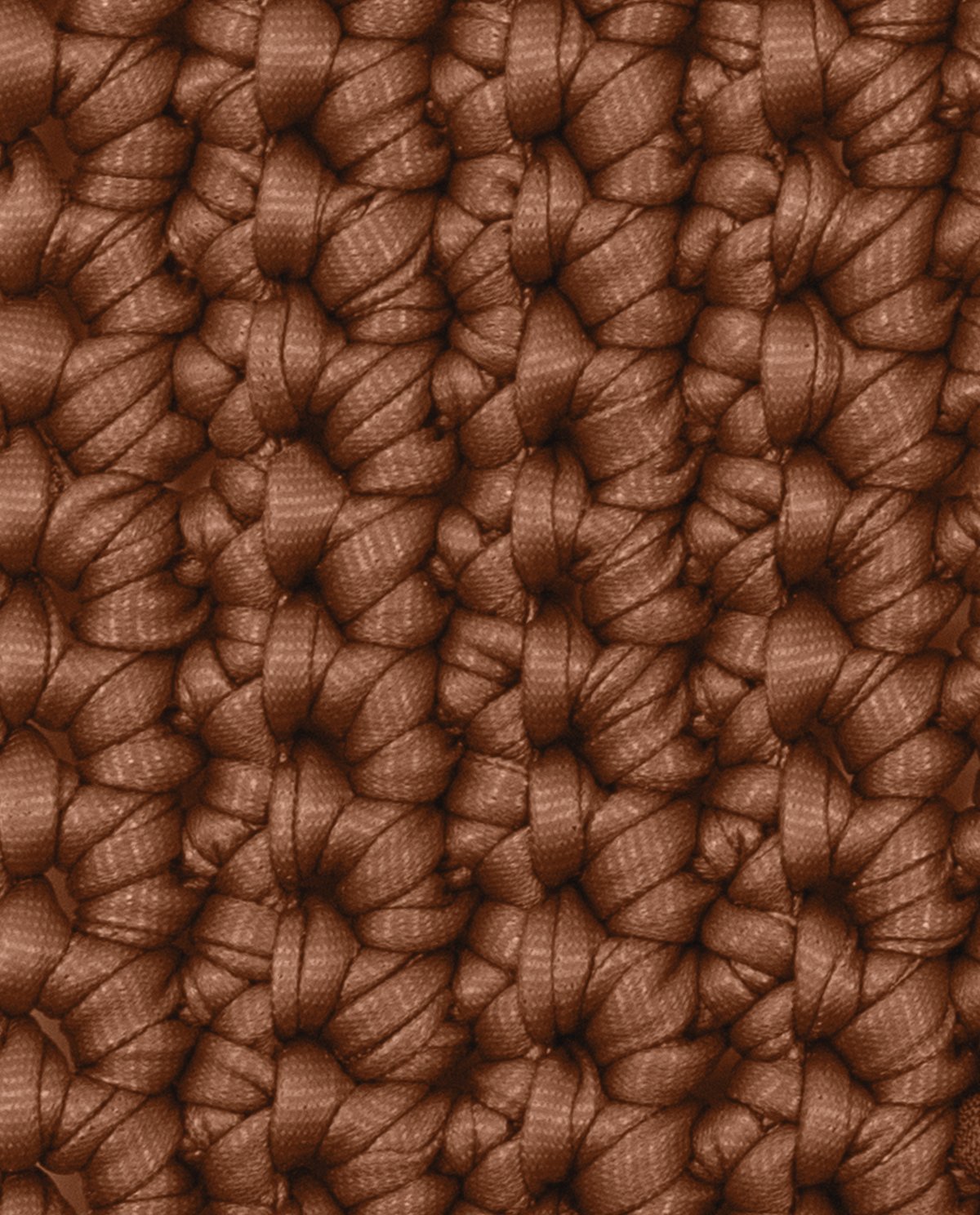 Tecido castanho tricotado com nós apertados