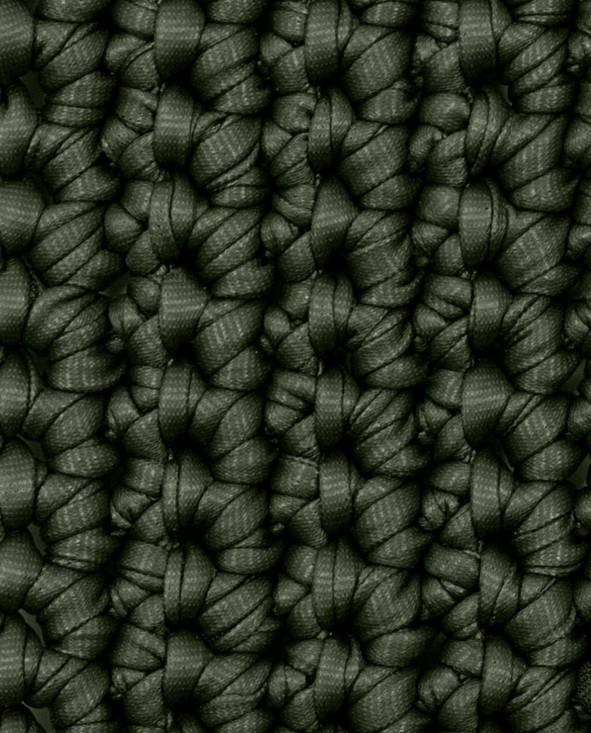 Textura de tecido tricotado grosso verde escuro