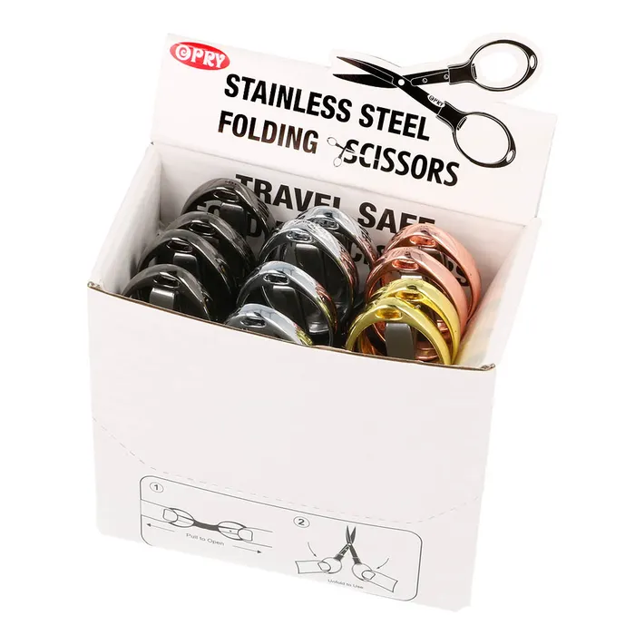 Tesouras dobráveis de aço inoxidável em caixa branca com texto e instruções