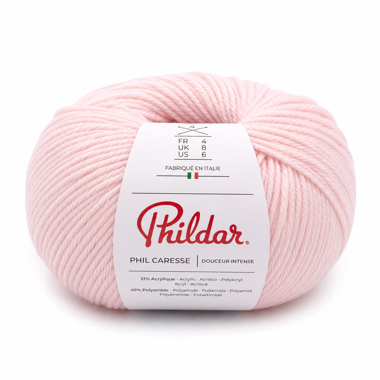 Novelo de lã rosa claro com etiqueta branca Phildar