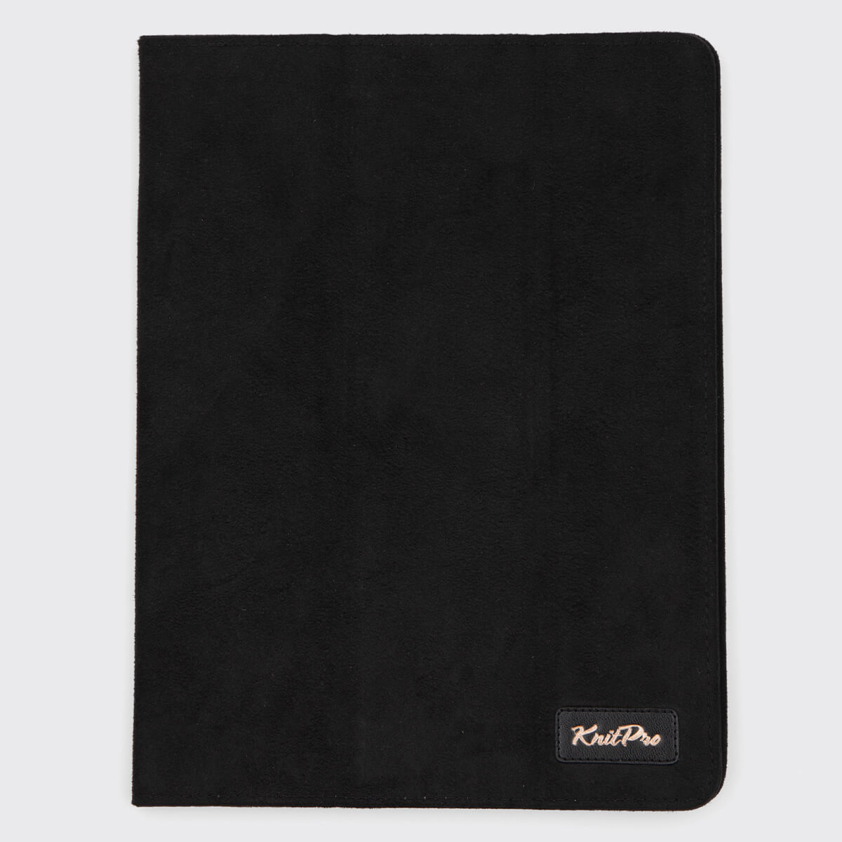 Capa preta rectangular com etiqueta KnitPro no canto inferior direito
