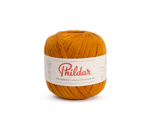 Novelo de fio de algodão laranja mostarda com rótulo Phildar