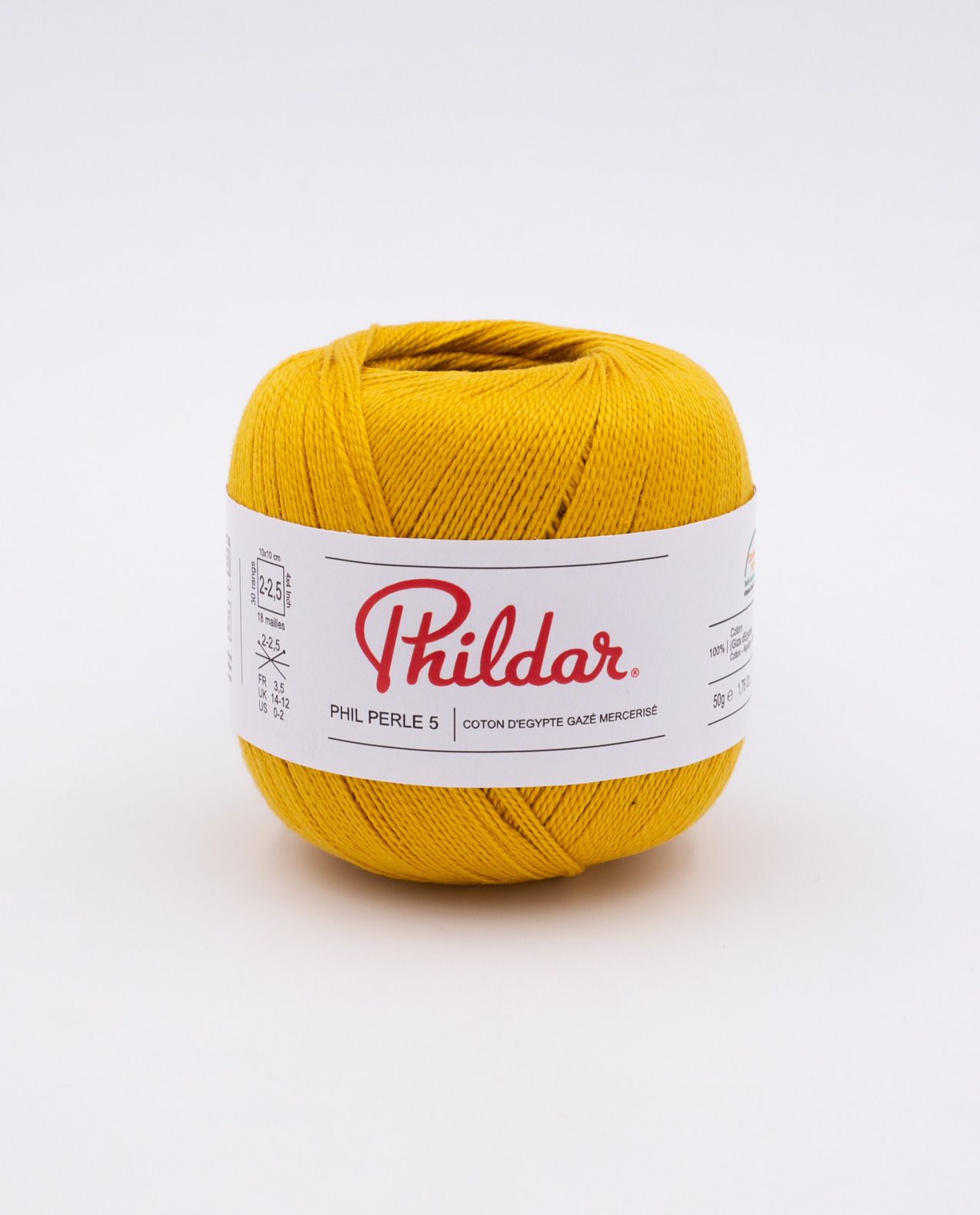 Rolo de fio amarelo Phildar com etiqueta branca