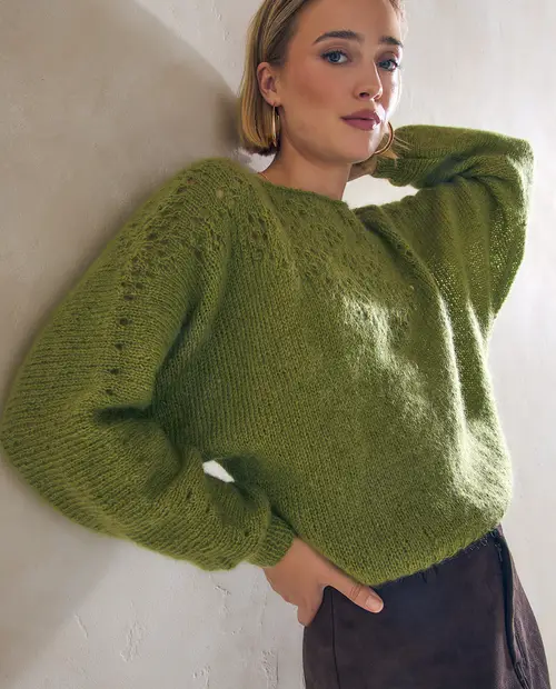 Camisola de malha verde com padrão aberto nos ombros