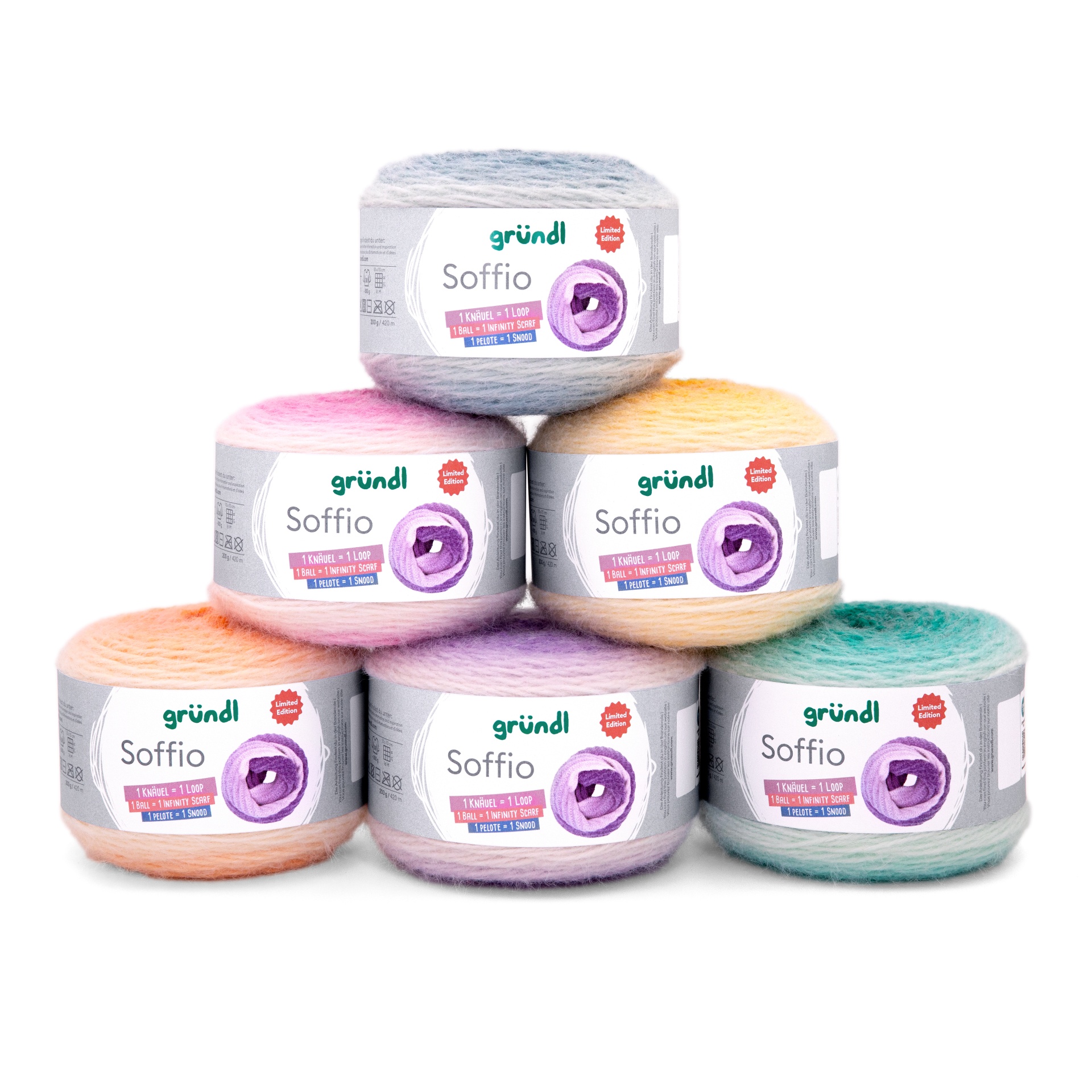 Conjunto de novelos de lã colorida da marca gründl com etiquetas revolvidas e fundo branco