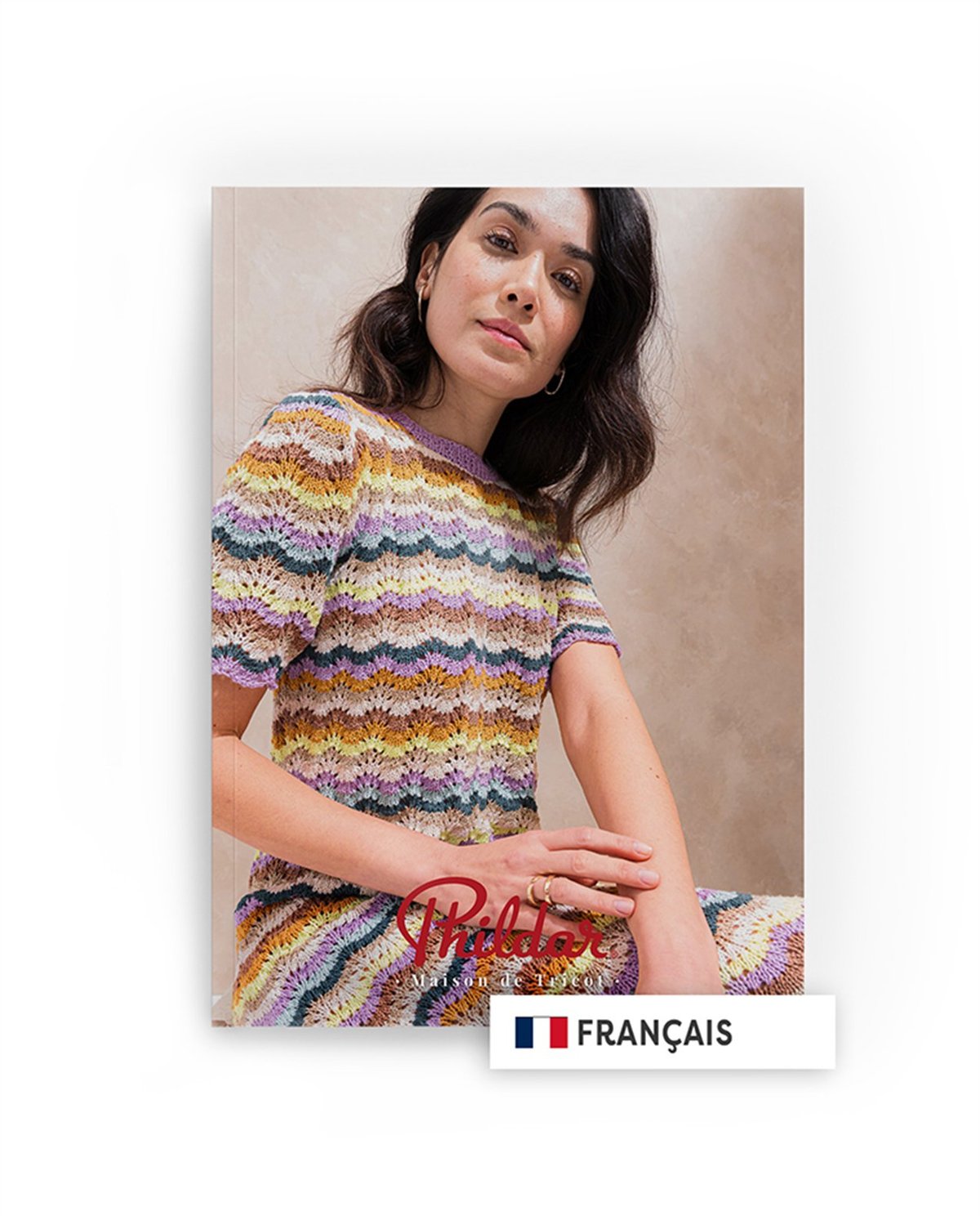 Capa de livro com mulher vestindo vestido de malha colorida