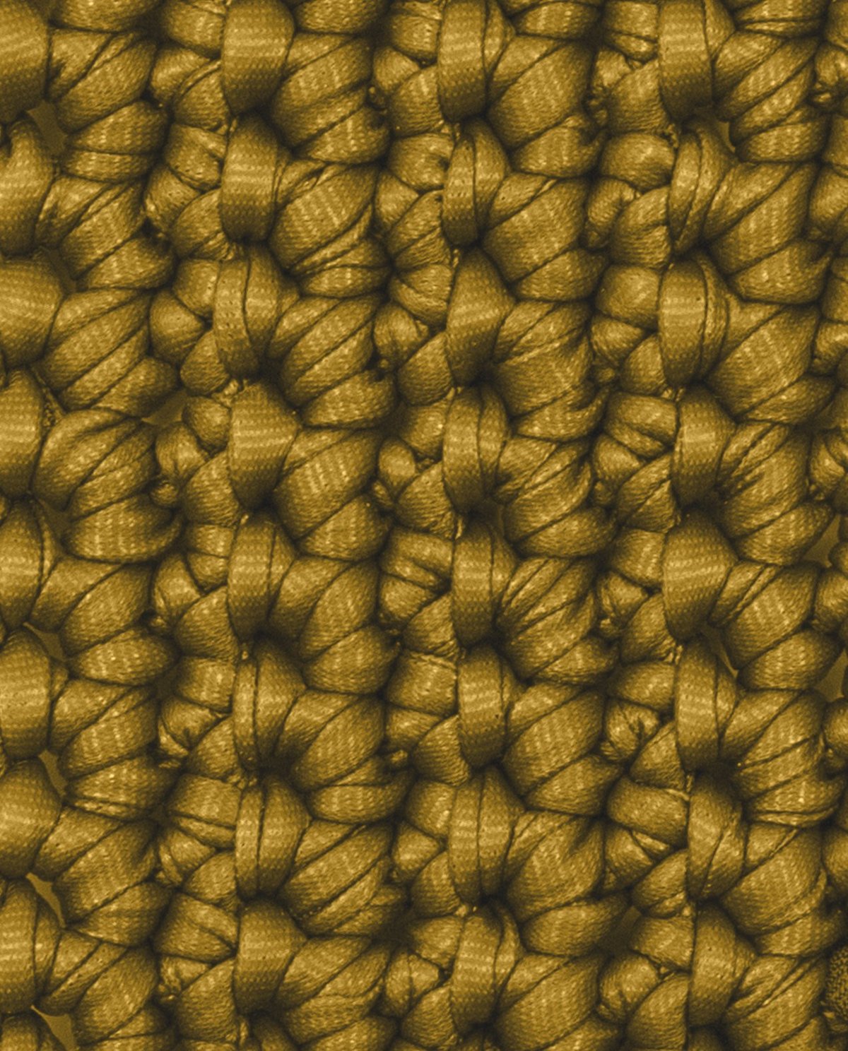 Close-up de tecido trançado castanho com textura grossa