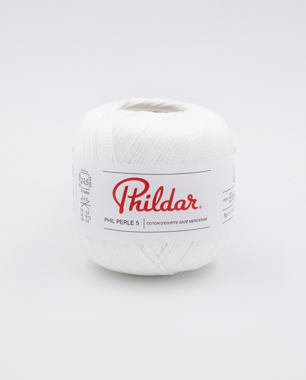 Rolo de fio branco de algodão Phildar com etiqueta